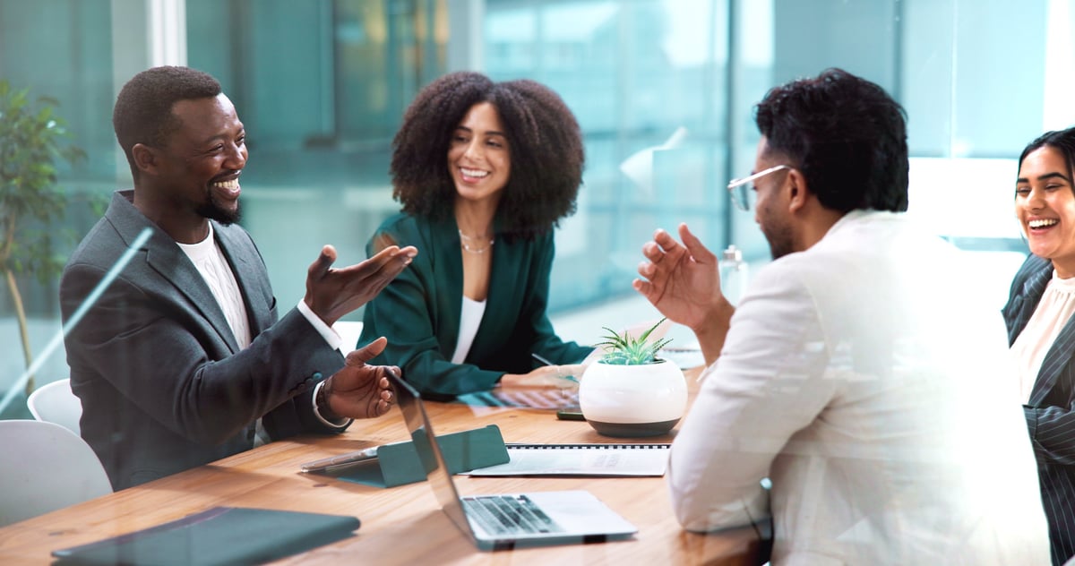 Business colleagues reviewing plans together in a modern office